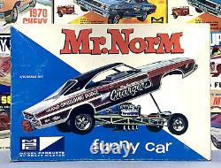 Mpc 1969 Dodge M. Norm Super Charger Funny Car Kit#714-200 Amt 1/25 Complet	 
<br/>   
 <br/>


(Note: 'complet' should have an acute accent on the 'e' in French)