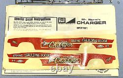 Mpc 1969 Dodge M. Norm Super Charger Funny Car Kit#714-200 Amt 1/25 Complet<br/><br/> (Note: 'complet' should have an acute accent on the 'e' in French)