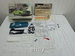 Vtg 1968 Shelby Cobra GT 500 AMT 125 Modèle Kit T296 200 Drag Road Racing G. T	<br/>


<br/>
  Translation: Kit de modèle Vtg 1968 Shelby Cobra GT 500 AMT 125 T296 200 Drag Road Racing G. T